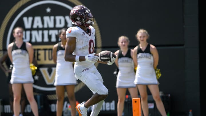 Aug 31, 2024; Nashville, Tennessee, USA;  Virginia Tech Hokies wide receiver Ali Jennings (0) scores off of a broken play against the Vanderbilt Commodores during the second half at FirstBank Stadium. Mandatory Credit: Steve Roberts-USA TODAY Sports