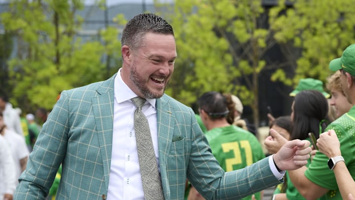 Sep 6, 2025; Eugene, Oregon, USA; Oregon Ducks head coach Dan Lanning greets fans before a game against the Oklahoma State Cowboys at Autzen Stadium. Sep 6, 2025; Eugene, Oregon, USA; Oregon Ducks head coach Dan Lanning greets fans before a game against the Oklahoma State Cowboys at Autzen Stadium.