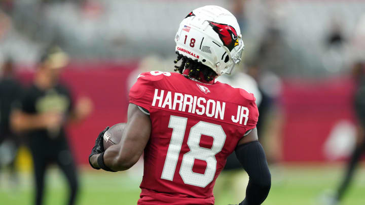 Aug 10, 2024; Glendale, Arizona, USA; Arizona Cardinals wide receiver Marvin Harrison Jr. (18) warms up before facing the New Orleans Saints at State Farm Stadium. Mandatory Credit: Joe Camporeale-USA TODAY Sports