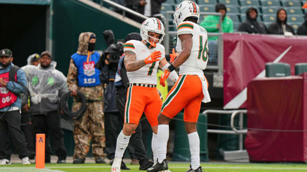 Miami Hurricanes wide receiver Xavier Restrepo (7) celebrates his touchdown with wide receiver Isaiah Horton (16) 