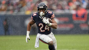 Dec 31, 2023; Chicago, Illinois, USA;  Chicago Bears running back Khalil Herbert (24) runs with the ball against the Atlanta Falcons at Soldier Field. Mandatory Credit: Jamie Sabau-Imagn Images