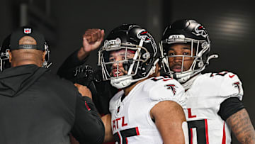 Dec 8, 2024; Minneapolis, Minnesota, USA; Atlanta Falcons running back Avery Williams (26) and cornerback Dee Alford (20) prepare to enter the field before the game against the Minnesota Vikings at U.S. Bank Stadium. Mandatory Credit: Jeffrey Becker-Imagn Images