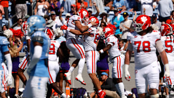 Cade Klubnik celebrates with Christian Bentancur in Clemson v North Carolina game 