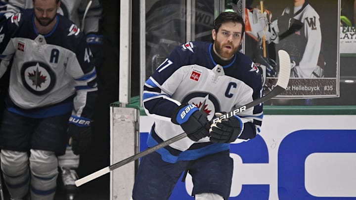 May 17, 2025; Dallas, Texas, USA; Winnipeg Jets center Adam Lowry (17) takes the ice to skate in warmups prior to the game against the Dallas Stars in game six of the second round of the 2025 Stanley Cup Playoffs at American Airlines Center. Mandatory Credit: Jerome Miron-Imagn Images