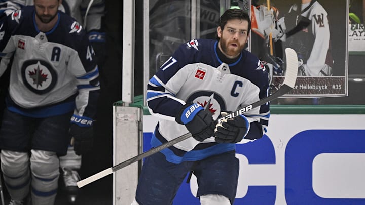 May 17, 2025; Dallas, Texas, USA; Winnipeg Jets center Adam Lowry (17) takes the ice to skate in warmups prior to the game against the Dallas Stars in game six of the second round of the 2025 Stanley Cup Playoffs at American Airlines Center. Mandatory Credit: Jerome Miron-Imagn Images