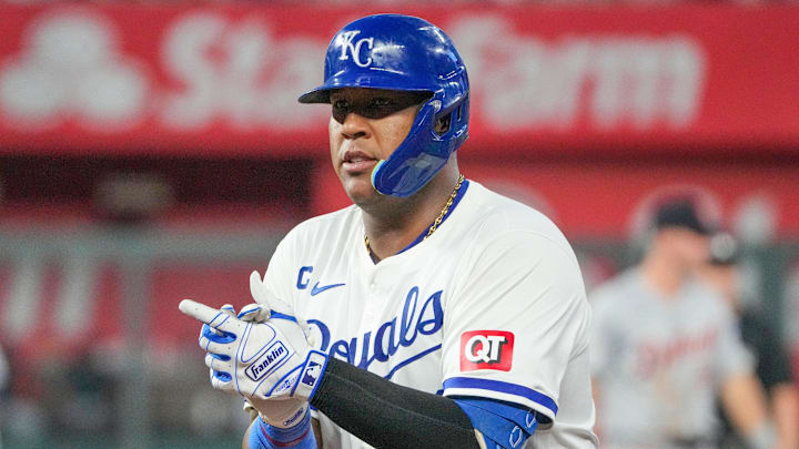 Sep 16, 2024; Kansas City, Missouri, USA; Kansas City Royals catcher Salvador Perez (13) celebrates toward the dugout against the Detroit Tigers after hitting a single in the third inning at Kauffman Stadium. Mandatory Credit: Denny Medley-Imagn Images