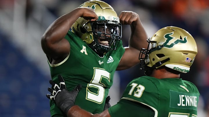 Nay`Quan Wright (5) is part of a grinding USF running attack