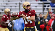 Nov 23, 2024; Chestnut Hill, Massachusetts, USA;  Boston College Eagles quarterback Grayson James (14) warms up before a game against the North Carolina Tar Heels at Alumni Stadium. Mandatory Credit: Eric Canha-Imagn Images
