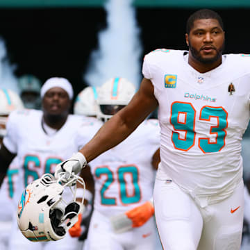 Miami Dolphins defensive tackle Calais Campbell (93) enters the field before the game against the Arizona Cardinals at Hard Rock Stadium last season.