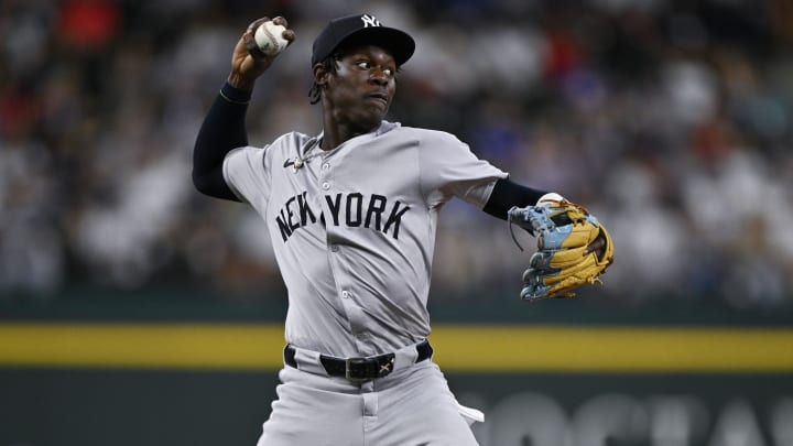 Sep 2, 2024; Arlington, Texas, USA; New York Yankees third baseman Jazz Chisholm Jr. (13) throws to first base during the second inning at Globe Life Field. Mandatory Credit: Jerome Miron-USA TODAY Sports