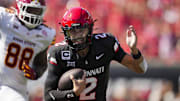 Oct 4, 2025; Cincinnati, Ohio, USA;  Cincinnati Bearcats quarterback Brendan Sorsby (2) runs with the ball against the Iowa State Cyclones in the first half at Nippert Stadium. Mandatory Credit: Aaron Doster-Imagn Images