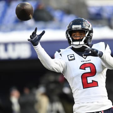 Jan 20, 2024; Baltimore, MD, USA; Houston Texans wide receiver Robert Woods (2) warms before a 2024 AFC divisional round game against the Baltimore Ravens at M&T Bank Stadium.