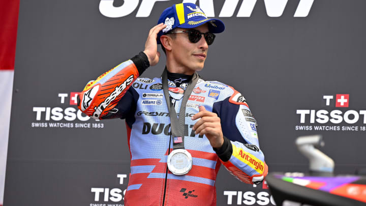 Apr 13, 2024; Austin, TX, USA; Marc Marquez (93) of Spain and Gresini Racing MotoGP celebrates with his medal after he finishes in second place in the Americas Grand Prix sprint race at Circuit of The Americas. Mandatory Credit: Jerome Miron-USA TODAY Sports