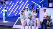 Bay Club golfers Shane Lowry, left, Ludvig Aberg and Wyndham Clark, right, during their golf match at SoFi Center, the home of TGL, the interactive golf league founded by Tiger Woods and Rory McIlroy on January 7, 2025 in Palm Beach Gardens, Florida.