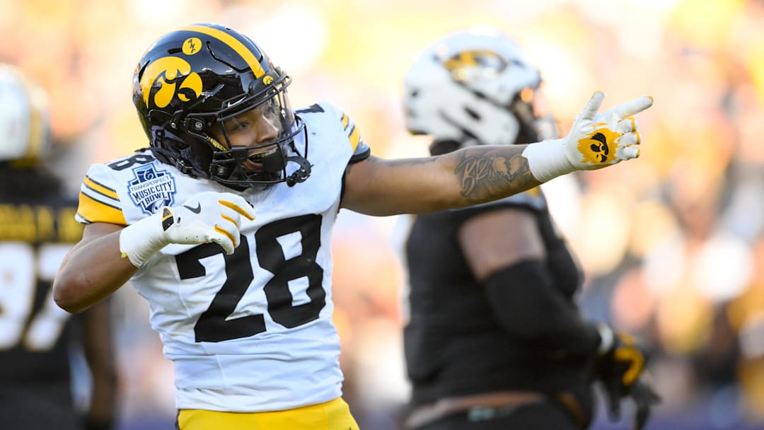 Dec 30, 2024; Nashville, TN, USA; Iowa Hawkeyes running back Kamari Moulton (28) celebrates his first down against the Missouri Tigers during the first half at Nissan Stadium. Mandatory Credit: Steve Roberts-Imagn Images Dec 30, 2024; Nashville, TN, USA; Iowa Hawkeyes running back Kamari Moulton (28) celebrates his first down against the Missouri Tigers during the first half at Nissan Stadium. Mandatory Credit: Steve Roberts-Imagn Images