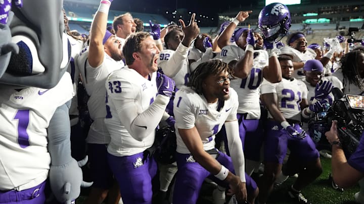 Sep 1, 2025; Chapel Hill, North Carolina, USA; TCU Horned Frogs players celebrate after the game at Kenan Stadium. Mandatory Credit: Bob Donnan-Imagn Images Sep 1, 2025; Chapel Hill, North Carolina, USA; TCU Horned Frogs players celebrate after the game at Kenan Stadium. Mandatory Credit: Bob Donnan-Imagn Images