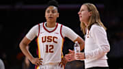 Jan 12, 2025; Los Angeles, California, USA; USC Trojans head coach Lindsay Gottlieb talks to guard JuJu Watkins (12) during the second quarter against the Penn State Nittany Lions at Galen Center. Mandatory Credit: Robert Hanashiro-Imagn Images