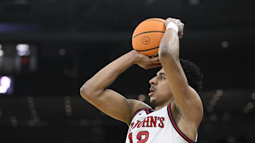 Mar 20, 2025; Providence, RI, USA;  St. John's Red Storm guard RJ Luis Jr. (12) puts up a shot during the second half against the Omaha Mavericks at Amica Mutual Pavilion. Mandatory Credit: Eric Canha-Imagn Images