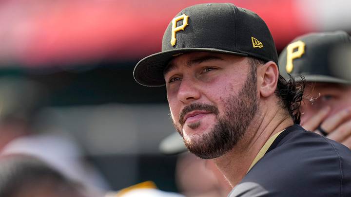 Pittsburgh Pirates starting pitcher Paul Skenes (30) watches from the dugout in the sixth inning of the MLB National League game between the Cincinnati Reds and the Pittsburgh Pirates at Great American Ball Park in downtown Cincinnati on Thursday, Sept. 25, 2025. The Reds won, 2-1.