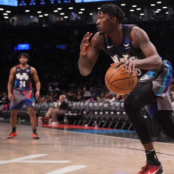 Apr 6, 2024; Brooklyn, New York, USA; Brooklyn Nets power forward Dorian Finney-Smith (28) dribbles the ball against the Detroit Pistons during the second half at Barclays Center.