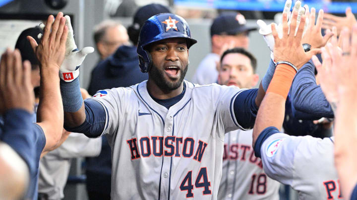 Jul 2, 2024; Toronto, Ontario, CAN;  Houston Astros left fielder Yordan Alvarez (44) celebrates with team mates in the dugout after hitting a three run home run against the Toronto Blue Jays in the fifth inning at Rogers Centre. 