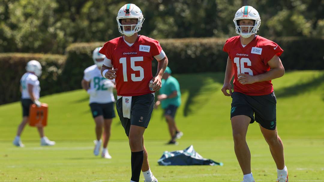 Miami Dolphins quarterbacks Cam Miller (15) and quarterback Mark Gronowski (16) work during rookie minicamp at the Baptist Health Training Complex.