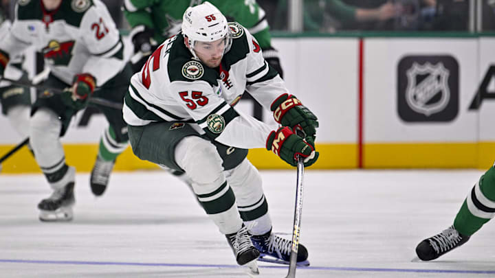 Sep 23, 2025; Dallas, Texas, USA; Minnesota Wild defenseman David Jiricek (55) chases the puck during the second period against the Dallas Stars at American Airlines Center.