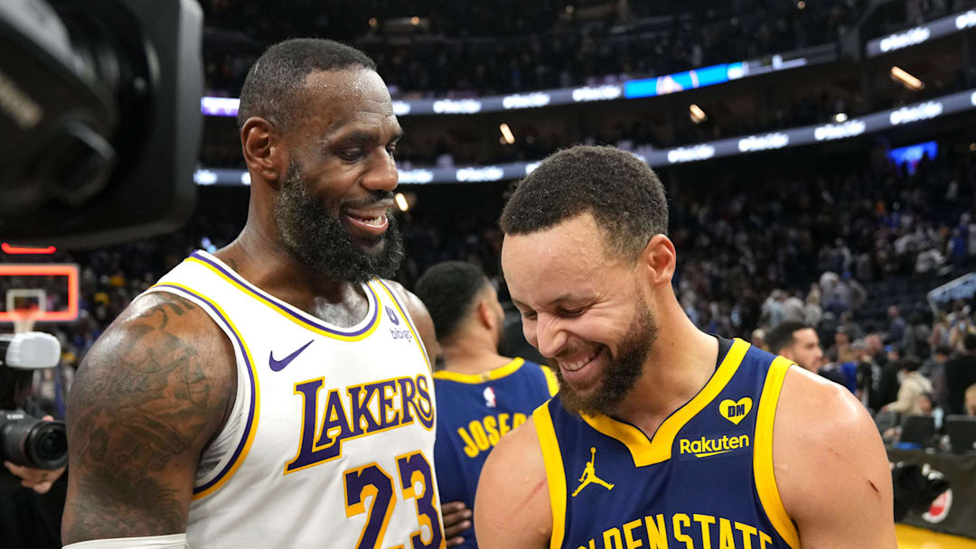 Jan 27, 2024; San Francisco, California, USA; Los Angeles Lakers forward LeBron James (23) and Golden State Warriors guard Stephen Curry (right). Mandatory Credit: Darren Yamashita-Imagn Images