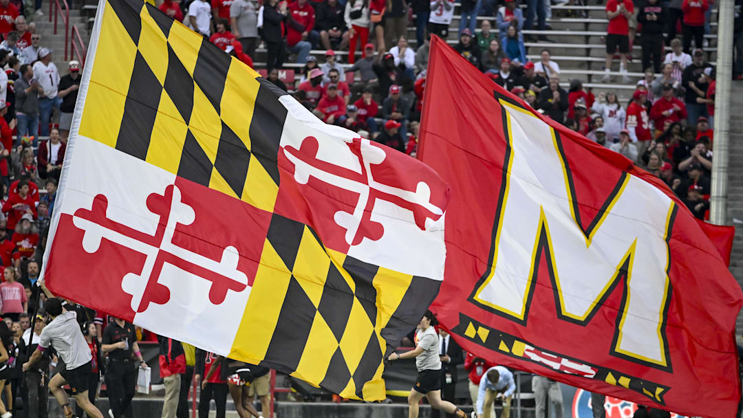 Oct 11, 2025; College Park, Maryland, USA;  Maryland state and Maryland Terrapins school flags on display after a touchdown  during the game against the Nebraska Cornhuskers at SECU Stadium. Mandatory Credit: Tommy Gilligan-Imagn Images