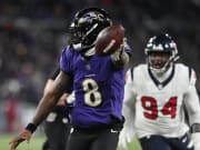 Jan 20, 2024; Baltimore, MD, USA; Baltimore Ravens quarterback Lamar Jackson (8) runs the ball.