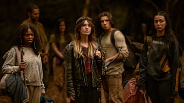 L-R: Silvana Estifanos as Teen Britt, Joel McHale as Kodiak, Ashley Sutton as Hanna, Sophie Thatcher as Teen Natalie, Kevin Alves as Teen Travis and Anisa Harris as Teen Robin in Yellowjackets, episode 8, season 3, streaming on Paramount+ with SHOWTIME, 2025. Photo Credit: Kailey Schwerman/Paramount+ with SHOWTIME.