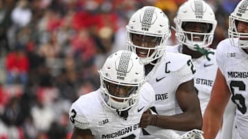Sep 7, 2024; College Park, Maryland, USA; Michigan State Spartans wide receiver Montorie Foster Jr. (3) and quarterback Aidan Chiles (2) celebrate after a first half touchdown against the Maryland Terrapins at SECU Stadium. Mandatory Credit: Tommy Gilligan-Imagn Images