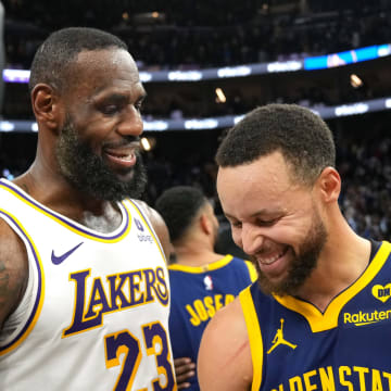 Jan 27, 2024; San Francisco, California, USA; Los Angeles Lakers forward LeBron James (23) and Golden State Warriors guard Stephen Curry (right) talk after the game at Chase Center. Mandatory Credit: Darren Yamashita-USA TODAY Sports