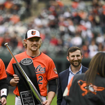 Mar 30, 2024; Baltimore, Maryland, USA;  Baltimore Orioles catcher Adley Rutschman (35) and shortstop Gunnar Henderson (2) are presented the Silver Slugger award before the game against the Los Angeles Angels at Oriole Park at Camden Yards.