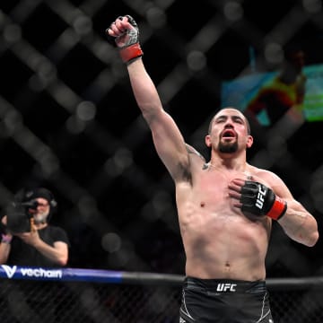 Sep 3, 2022; Paris, FRANCE; Robert Whittaker (red gloves) defeats Marvin Vettori (blue gloves) during UFC Fight Night at Accor Arena. Mandatory Credit: Per Haljestam-USA TODAY Sports