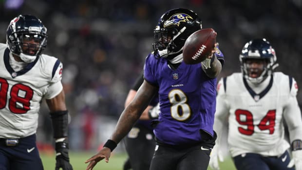 Jan 20, 2024; Baltimore, MD, USA;  Ravens’ Lamar Jackson runs for a touchdown vs. Texans.