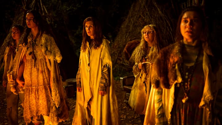 L-R: Anisa Harris as Teen Robin, Courtney Eaton as Teen Lottie, Sophie Nélisse as Teen Shauna, Samantha Hanratty as Teen Misty and Vanessa Prasad as Teen Gen in Yellowjackets, episode 7, season 3, streaming on Paramount+ with SHOWTIME, 2025. Photo Credit: Kailey Schwerman/Paramount+ with SHOWTIME.