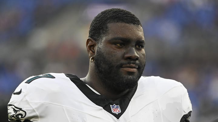 Philadelphia Eagles offensive guard Mekhi Becton (77) stands on the sidelines during the first half of a preseason game.