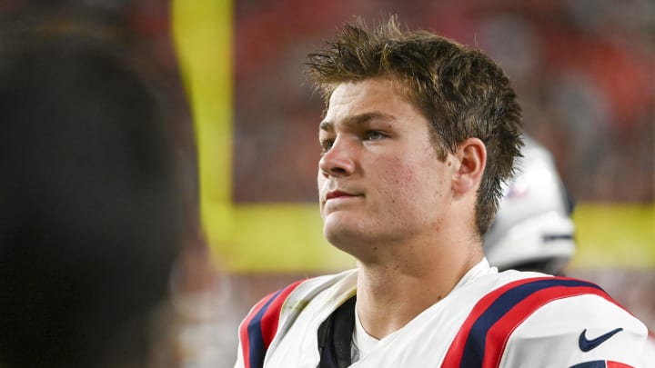 Aug 25, 2024; Landover, Maryland, USA;  New England Patriots quarterback Drake Maye (10) stands on the sidelines during the first half against the Washington Commanders at Commanders Field. Mandatory Credit: Tommy Gilligan-USA TODAY Sports