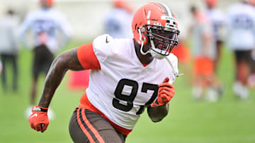May 25, 2022; Berea, OH, USA; Cleveland Browns defensive tackle Perrion Winfrey (97) runs a drill during organized team activities at CrossCountry Mortgage Campus.