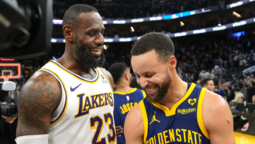 Jan 27, 2024; San Francisco, California, USA; Los Angeles Lakers forward LeBron James (23) and Golden State Warriors guard Stephen Curry (right) talk after the game at Chase Center. Mandatory Credit: Darren Yamashita-Imagn Images