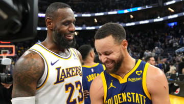 Jan 27, 2024; San Francisco, California, USA; Los Angeles Lakers forward LeBron James (23) and Golden State Warriors guard Stephen Curry (right) talk after the game at Chase Center. Mandatory Credit: Darren Yamashita-USA TODAY Sports