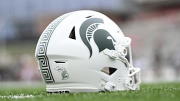 Sep 7, 2024; College Park, Maryland, USA; A detailed view of Michigan State Spartans helmet on the field before the game against the Maryland Terrapins at SECU Stadium. Mandatory Credit: Tommy Gilligan-Imagn Images