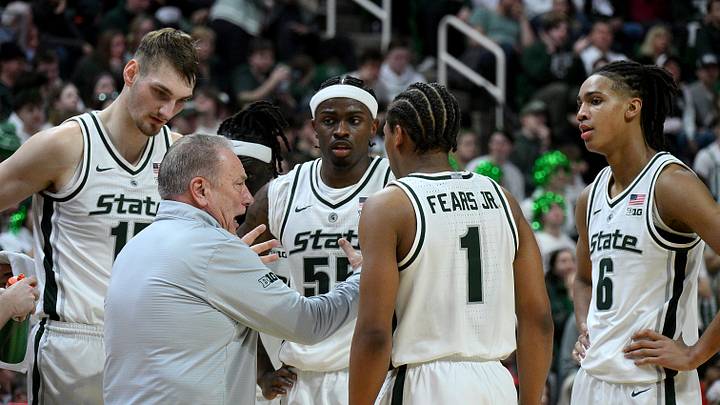 Feb 22, 2026; East Lansing, Michigan, USA;  Michigan State Spartans head coach Tom Izzo huddles with his players during the first half against the Ohio State Buckeyes at Jack Breslin Student Events Center. Mandatory Credit: Dale Young-Imagn Images