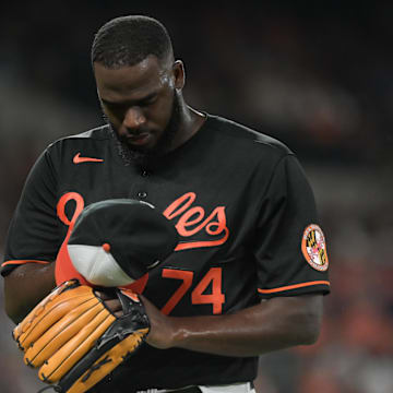 Aug 8, 2023; Baltimore, Maryland, USA;  Baltimore Orioles relief pitcher Felix Bautista (74) looks towards his hat after being relieved during the ninth inning against the Houston Astros at Oriole Park at Camden Yards. 