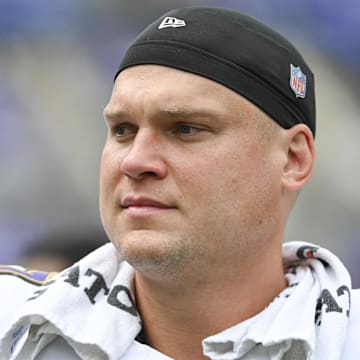 Aug 17, 2024; Baltimore, Maryland, USA; Baltimore Ravens defensive end Brent Urban (97) on the sidelines during the second half against the Atlanta Falcons at M&T Bank Stadium. Mandatory Credit: Tommy Gilligan-Imagn Images