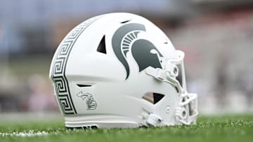 Sep 7, 2024; College Park, Maryland, USA; A detailed view of Michigan State Spartans helmet on the field before the game against the Maryland Terrapins at SECU Stadium. Mandatory Credit: Tommy Gilligan-Imagn Images
