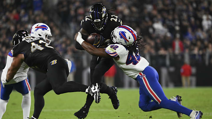 Sep 29, 2024; Baltimore, Maryland, USA; Baltimore Ravens fullback Patrick Ricard (42) blocks Buffalo Bills safety Damar Hamlin (3) as running back Derrick Henry (22) runs through linebacker Dorian Williams (42) tackle attempt during the second half at M&T Bank Stadium. Mandatory Credit: Tommy Gilligan-Imagn Images Sep 29, 2024; Baltimore, Maryland, USA; Baltimore Ravens fullback Patrick Ricard (42) blocks Buffalo Bills safety Damar Hamlin (3) as running back Derrick Henry (22) runs through linebacker Dorian Williams (42) tackle attempt during the second half at M&T Bank Stadium. Mandatory Credit: Tommy Gilligan-Imagn Images