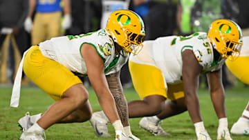 Sep 28, 2024; Pasadena, California, USA; Oregon Ducks defensive end Matayo Uiagalelei (10) and defensive lineman A'Mauri Washington (52) during the fourth quarter against the UCLA Bruins at Rose Bowl. Mandatory Credit: Robert Hanashiro-Imagn Images