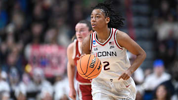 Mar 29, 2025; Spokane, WA, USA; UConn Huskies guard KK Arnold (2) controls the ball during a Sweet 16 NCAA Tournament game at Spokane Arena. Mandatory Credit: James Snook-Imagn Images